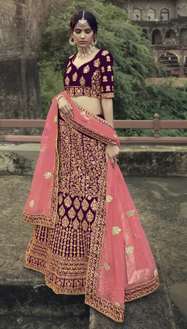 Wine dori, zari and thread embroidered with stone work satin semi stitched lehenga