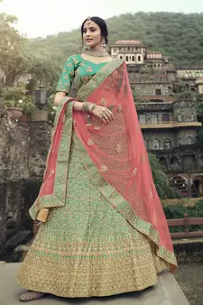 Green dori, zari and thread embroidered with stone work satin semi stitched lehenga