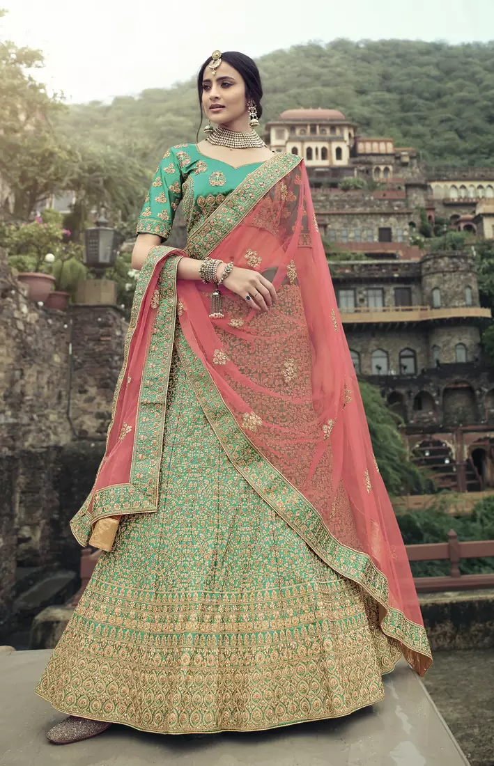 Green dori, zari and thread embroidered with stone work satin semi stitched lehenga