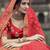 Red dori, zari and thread embroidered with stone work satin semi stitched lehenga