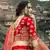 Red dori, zari and thread embroidered with stone work satin semi stitched lehenga