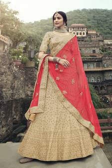 Beige dori, zari and thread embroidered with stone work satin semi stitched lehenga