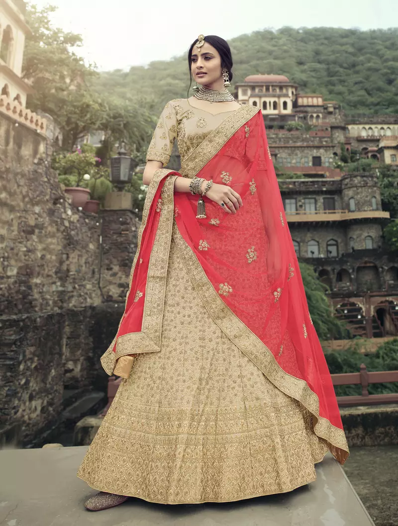 Beige dori, zari and thread embroidered with stone work satin semi stitched lehenga
