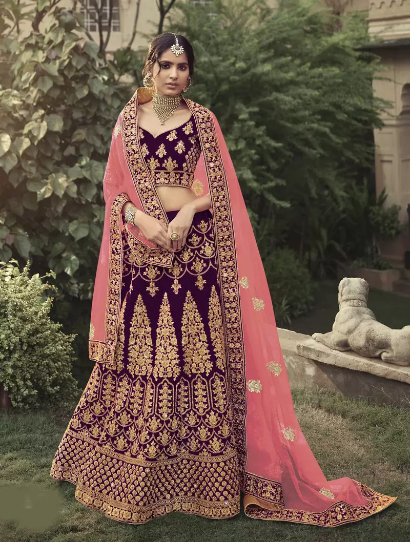 Wine dori, zari and thread embroidered with stone work satin semi stitched lehenga