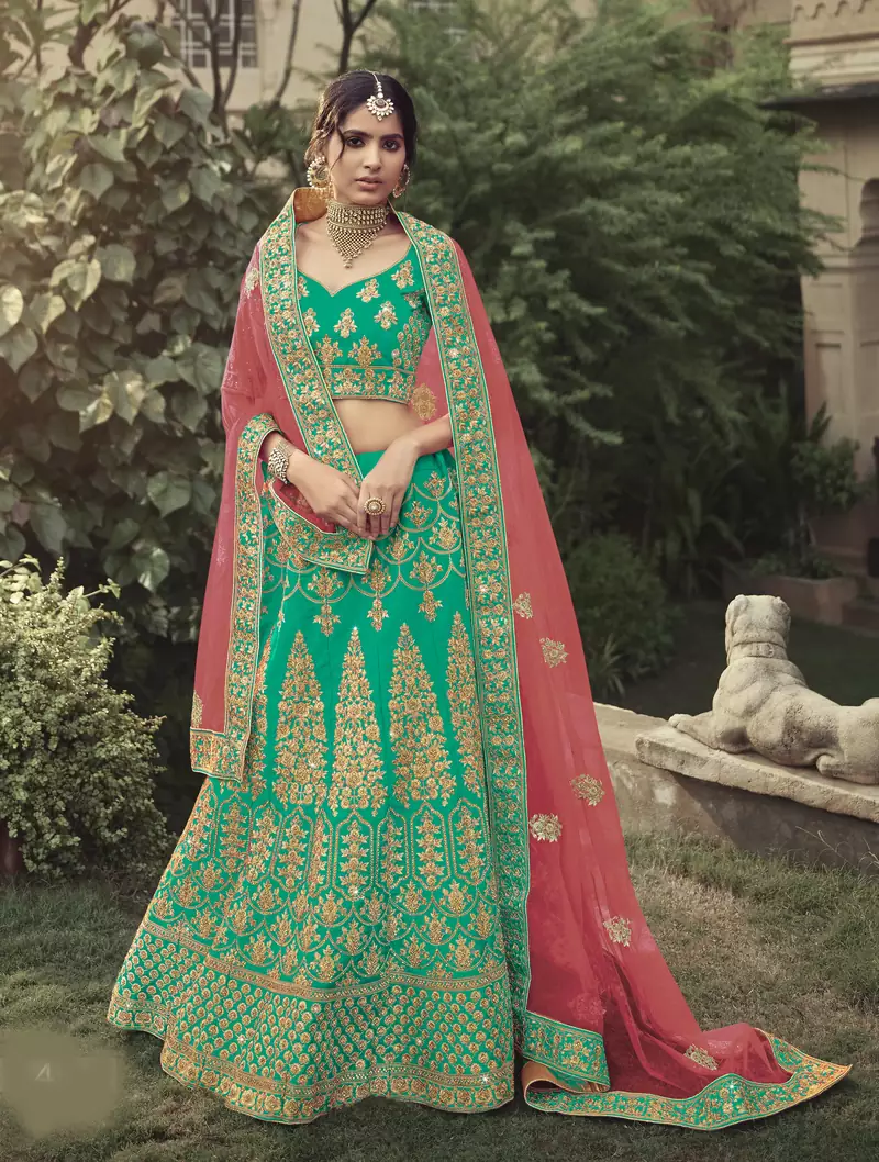 Green dori, zari and thread embroidered with stone work satin semi stitched lehenga