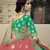 Green dori, zari and thread embroidered with stone work satin semi stitched lehenga