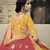 Yellow dori, zari and thread embroidered with stone work satin semi stitched lehenga