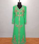 Turquoise luxurious Moroccan KaftanWith Sun-proof hijab.