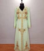 Light Green luxurious Moroccan Kaftan	With Sun-proof hijab.