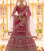 Pink Zari, zarkan, zardosi and thread embroidered velvet Semi Stitched wedding Lehenga