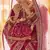 Pink Zari, zarkan, zardosi and thread embroidered velvet semi stitched wedding lehenga