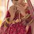 Pink Zari, zarkan, zardosi and thread embroidered velvet semi stitched wedding lehenga