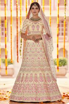 Yellow Sequins, zarkan and thread embroidered crepe silk semi stitched wedding lehenga