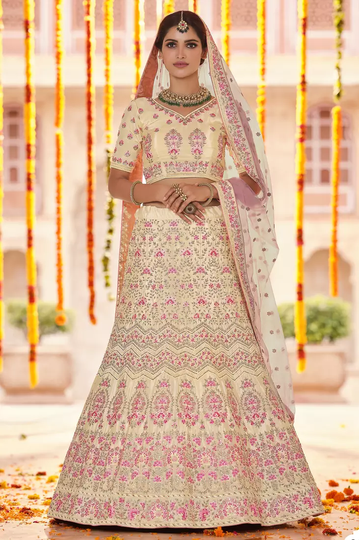 Yellow Sequins, zarkan and thread embroidered crepe silk semi stitched wedding lehenga