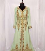 Light Green luxurious Moroccan Kaftan	With Sun-proof hijab.