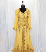 Yellow luxurious Moroccan Kaftan	With Sun-proof hijab.