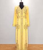 Yellow luxurious Moroccan Kaftan With Sun-proof hijab.