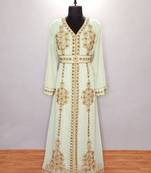 Light Green luxurious Moroccan Kaftan	With Sun-proof hijab.