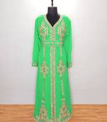 Turquoise luxurious Moroccan KaftanWith Sun-proof hijab.