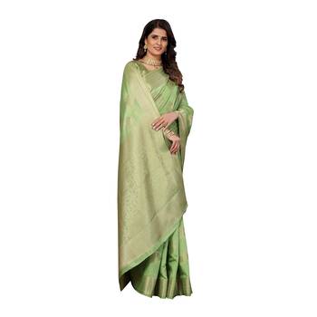 Green hand woven silk blend saree with blouse 2