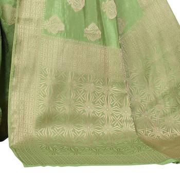 Green hand woven silk blend saree with blouse 4