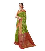 Green woven banarasi silk saree with blouse