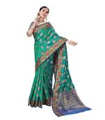 Green woven banarasi silk saree with blouse