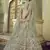 Spanish Green Thread, zari, dori and Sequins embroidered net semi stitched Bridal lehenga