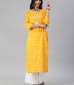mustard and white ikkat printed straight kurta with dori and tassel detailing on neckline