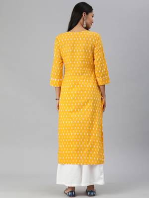 mustard and white ikkat printed straight kurta with dori and tassel detailing on neckline 2