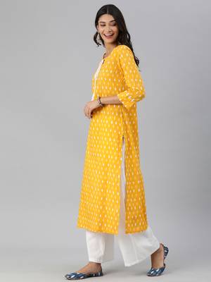 mustard and white ikkat printed straight kurta with dori and tassel detailing on neckline 3