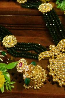 Green designer floral meenakari kundan studed onyx stone multilayer necklace set with earrings