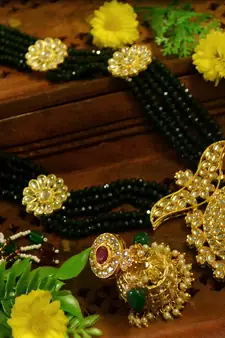 Green designer floral meenakari kundan studed onyx stone multilayer necklace set with earrings