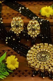 Black designer floral meenakari kundan studed onyx stone multilayer necklace set with earrings