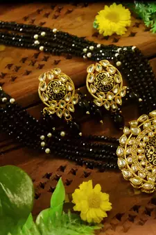 Black designer floral meenakari kundan studed onyx stone multilayer necklace set with earrings
