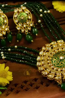Green designer floral meenakari kundan studed onyx stone multilayer necklace set with earrings