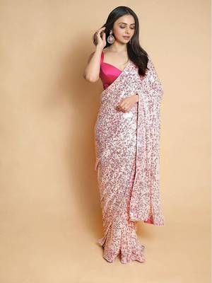 Rani pink embroidered georgette saree with blouse 1
