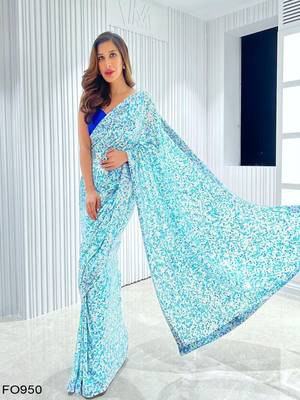 Dark blue embroidered georgette saree with blouse 1