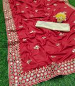 Red embroidered silk saree with blouse