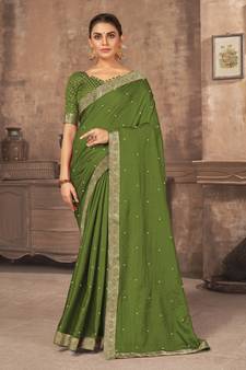 Dark green embroidered silk blend saree with blouse