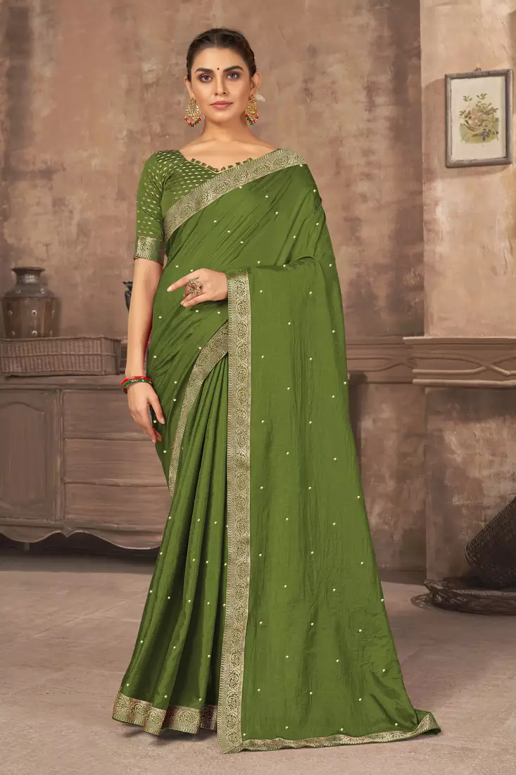 Dark green embroidered silk blend saree with blouse