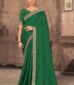 Green embroidered silk blend saree with blouse