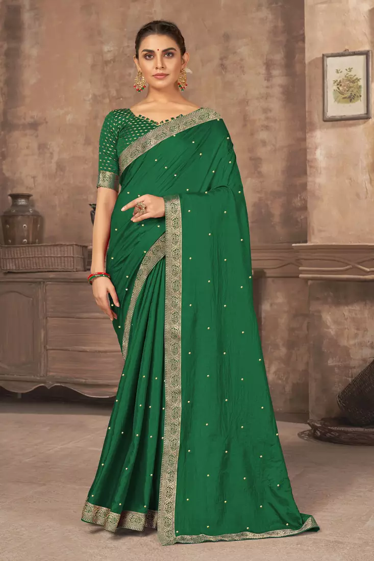 Green embroidered silk blend saree with blouse