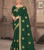 Green embroidered silk blend saree with blouse