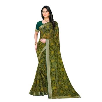 Green printed georgette saree with blouse 1