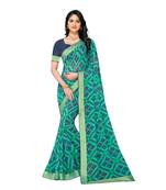 Turquoise printed georgette saree with blouse