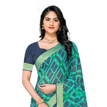 Turquoise printed georgette saree with blouse 2