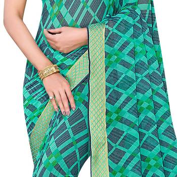 Turquoise printed georgette saree with blouse 4
