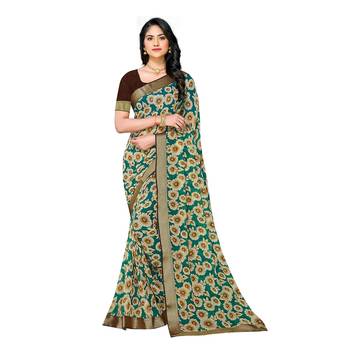 Teal printed georgette saree with blouse 1