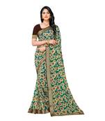 Teal printed georgette saree with blouse